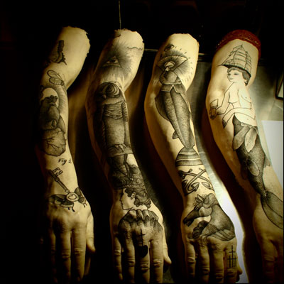  silicone casts of his arm and tattooed them using the traditional 